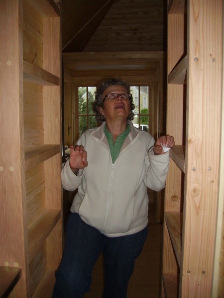 My mom getting ready to climb into the loft.