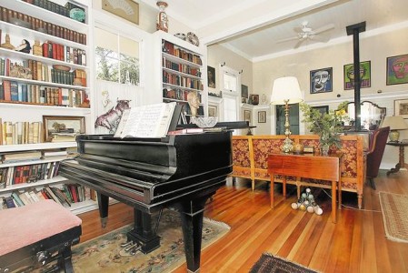 Unexpectedly, a grand piano greets visitors to the 500-square-foot home of Richard Steen and Jefferson Bailey. The home also features large artwork, antiques and a remodeled kitchen and bathroom.