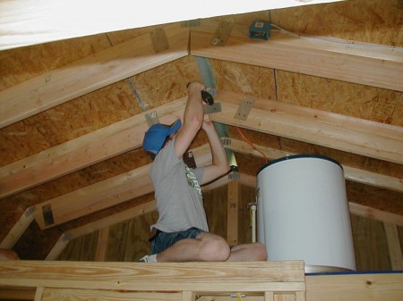 The R-30 insulation requires about 10 inches of clearance so you have to "add to" the 3 1/2 inches of 2X4 rafters to increase their depth to almost 10 inches to make room for the thick insulation sheets.