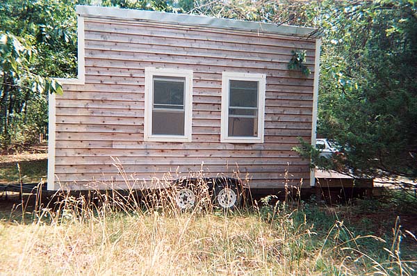 outside of tiny house with big windows