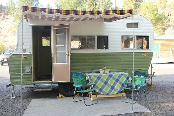 exterior of green vintage trailer