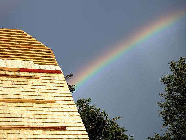 rainbow over roof