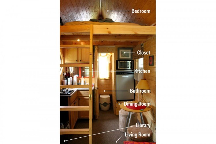 heres-a-look-inside-the-tiny-house-from-top-to-bottom-the-combination-of-wood-paneling-and-target-furniture-give-it-a-modern-rustic-feel
