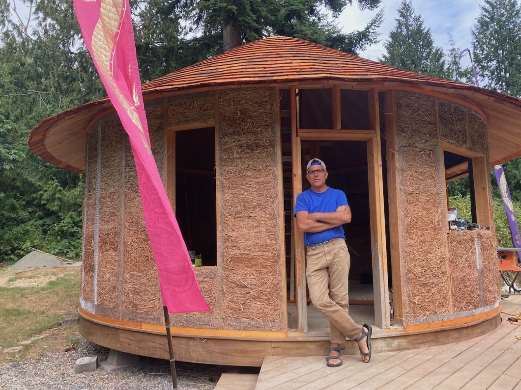 Eli in front of yurt