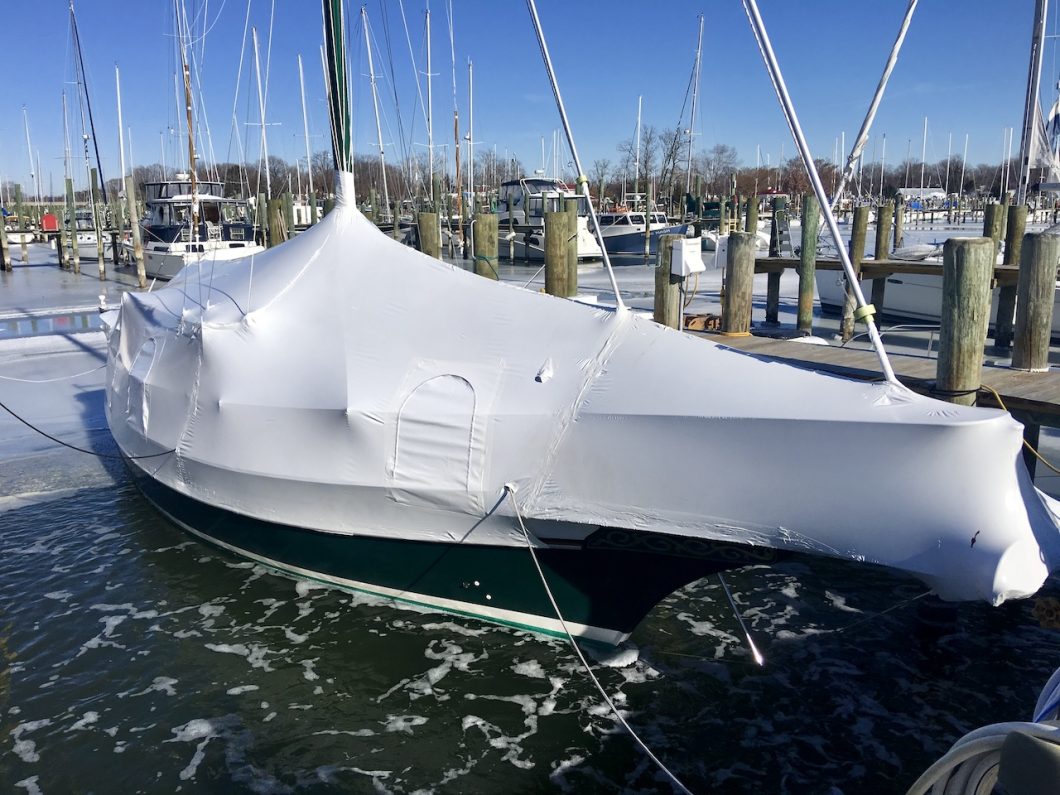 sailboat wrapped in plastic
